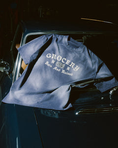 GROCERY X FOOTLOOSE TYCOON BORN & RAISED WASHED INVOICE TEE/ FADED PURPLE