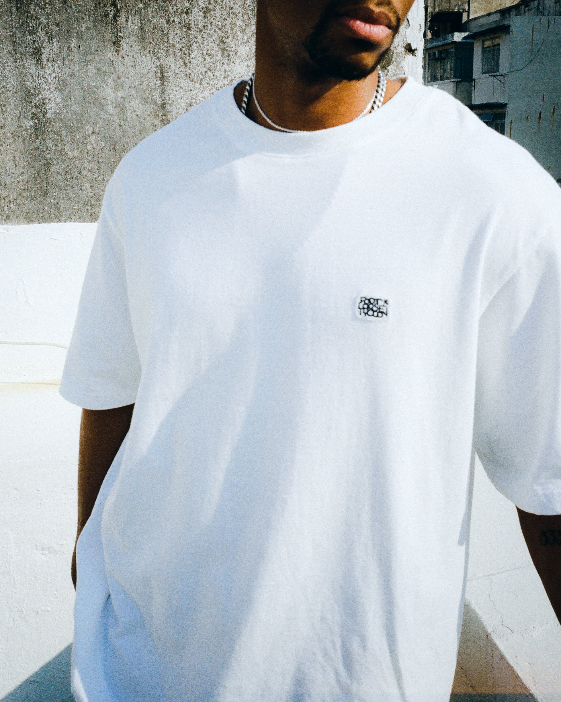 The "FOOTLOOSE" Trademark Tee